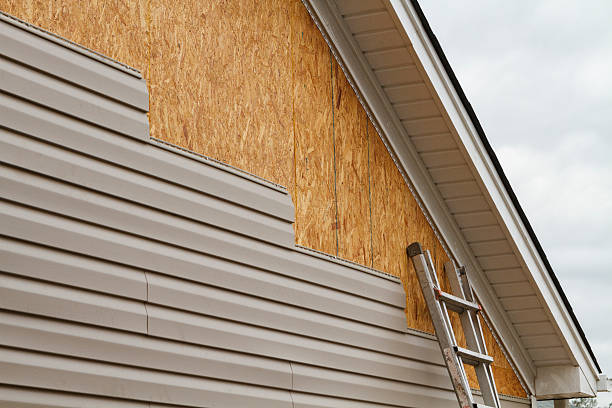 Professional Siding Installation technician working in Oceanside, NY